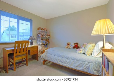 Kids Bedroom With Toys On The Bed