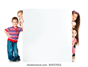 kids beside a white blank for text or image - Powered by Shutterstock