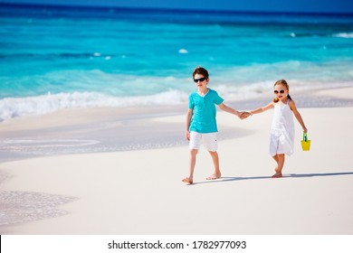 Kids brother and sister enjoying time at tropical beach
