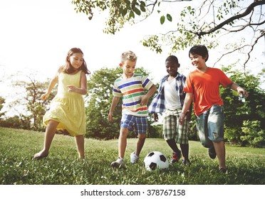 Kids Children Playing Football Fun Happiness Concept