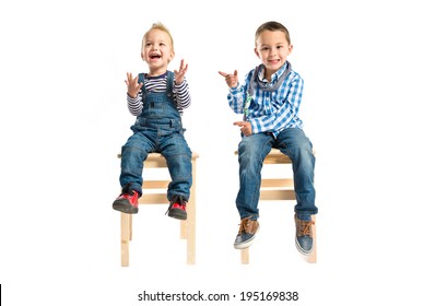 Kids Clapping And Pointing Over White Background 