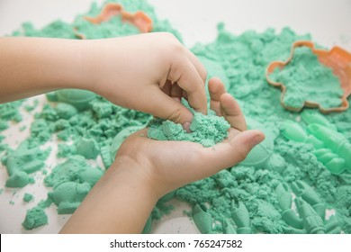 Kids Creativity. Children's Creativity. Kinetic Sand Isolated On White.