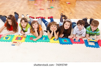 Kids crowd lying in line