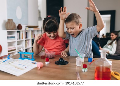 kids do chemical experiments in their home - Powered by Shutterstock