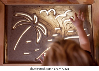 Kids drawing sand animation