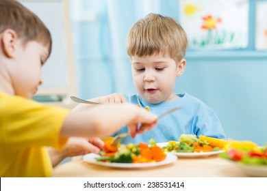 kids eating food in nursery or at home