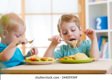 Kids Eating Healthy Food In Nursery Or At Home