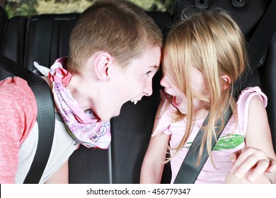 Kids Fighting In The Back Of A Car