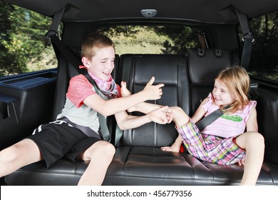 Kids Fighting In The Back Of A Car