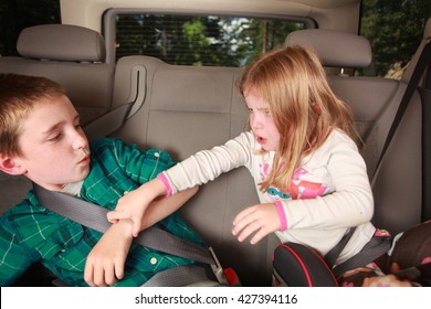 Kids Fighting In The Backseat Of A Car