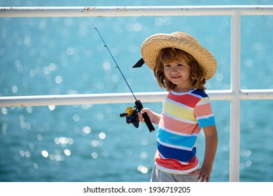 Kids Fishing. Child Fishing On The Lake. Young Fisher. Boy With Spinner At River.Boy Fishing At Jetty With Rod