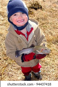  Kids Fishing - Young Boy Holding A Rainbow Trout Fish Caught Fly Fishing