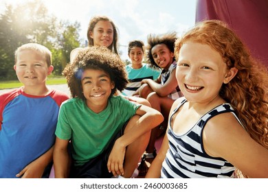 Kids, group and portrait on playground in park to relax with friends in summer on vacation. Happy, holiday and children together for camp, games or smile outdoor at middle school recess or break - Powered by Shutterstock