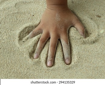 Kids Hand On Sand