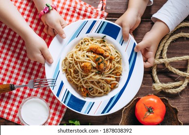 Kids Hands And Plate With Pasta On Table , Cooking At Home With Baby