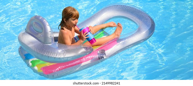 Kids happy summer. Summertime vacation. Child in pool. Boy swimming at swimmingpool. Funny kid on inflatable rubber mattress. Banner for header, copy space. Poster for web design.