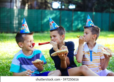 Kids Having A Birthday Party At The Park. 