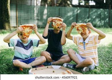 Kids Having Fun Eating Pizza