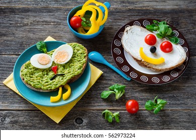 Kids Healthy Meal, Colorful And Funny Faces With Vegetables And Fruits On Bread. Children Breakfast Or Snack