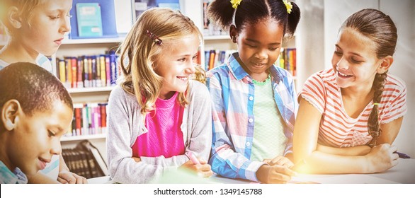 Kids interacting with each other in library at school