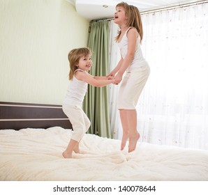 Kids Jumping On Bed