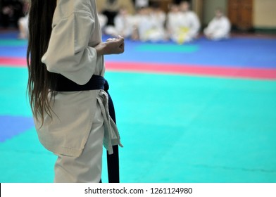 Kids Of Karate. Training And Exam In Karate. Teen Girl Demonstrates Kata.