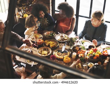 Kids Kissing Thanksgiving Dinner Celebration Concept