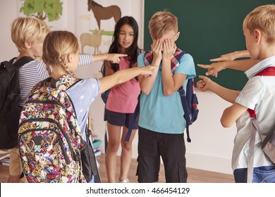 Kids Laughing At Their Classmate