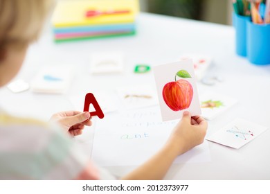 Kids learn to read. Colorful abc phonics flash cards for kindergarten and preschool children. Remote learning and homeschooling for young kid. Child reading sounds and letters. English lesson. - Shutterstock ID 2012373977
