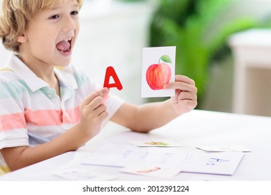 Kids learn to read. Colorful abc phonics flash cards for kindergarten and preschool children. Remote learning and homeschooling for young kid. Child reading sounds and letters. English lesson. - Shutterstock ID 2012391224