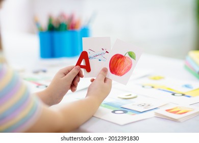 Kids learn to read. Colorful abc phonics flash cards for kindergarten and preschool children. Remote learning and homeschooling for young kid. Child reading sounds and letters. English lesson. - Shutterstock ID 2012391830