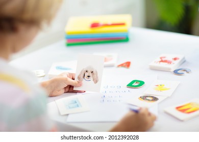 Kids learn to read. Colorful abc phonics flash cards for kindergarten and preschool children. Remote learning and homeschooling for young kid. Child reading sounds and letters. English lesson. - Shutterstock ID 2012392028