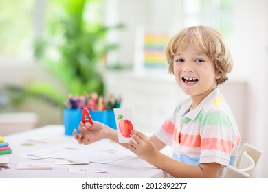 Kids learn to read. Colorful abc phonics flash cards for kindergarten and preschool children. Remote learning and homeschooling for young kid. Child reading sounds and letters. English lesson. - Shutterstock ID 2012392277