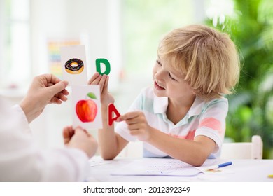 Kids Learn To Read. Colorful Abc Phonics Flash Cards For Kindergarten And Preschool Children. Remote Learning And Homeschooling For Young Kid. Child Reading Sounds And Letters. English Lesson.