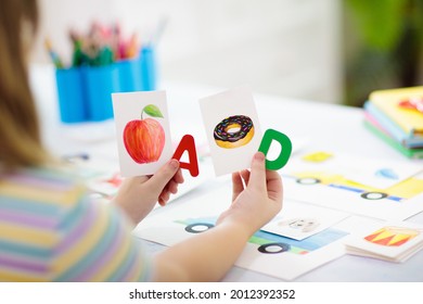 Kids learn to read. Colorful abc phonics flash cards for kindergarten and preschool children. Remote learning and homeschooling for young kid. Child reading sounds and letters. English lesson. - Shutterstock ID 2012392352
