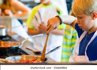 Kids Learning How To Cook In A Cooking Class.