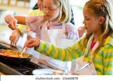 Kids Learning How To Cook In A Cooking Class.