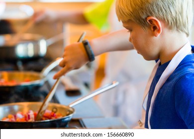 Kids Learning How To Cook In A Cooking Class.