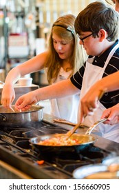 Kids Learning How To Cook In A Cooking Class.