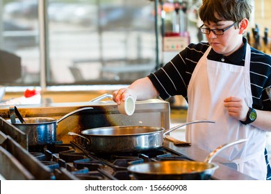 Kids Learning How To Cook In A Cooking Class.