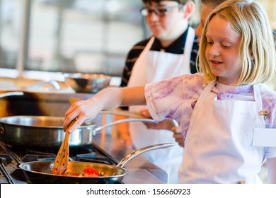 Kids Learning How To Cook In A Cooking Class.