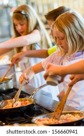 Kids Learning How To Cook In A Cooking Class.