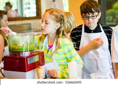 Kids Learning How To Cook In A Cooking Class.