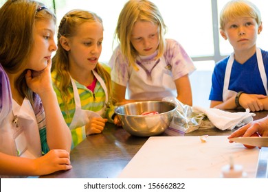 Kids Learning How To Cook In A Cooking Class.