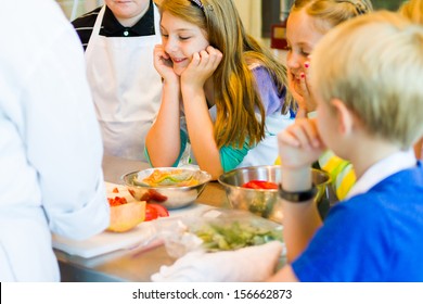 Kids Learning How To Cook In A Cooking Class.