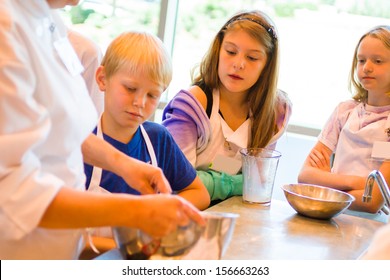 Kids Learning How To Cook In A Cooking Class.