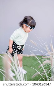 Kids Learning And Made Experience In Outdoor Concept. Two Years Old Child With 