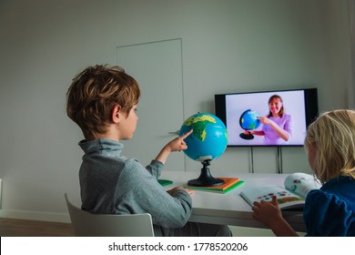 Kids learning remotely. Children having online lesson at home