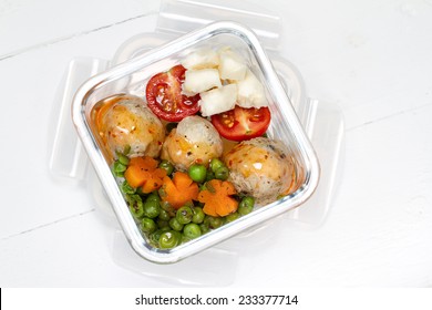 Kids Lunch Box: Stewed Peas And Carrots, Turkey Meat Balls, Cherry Tomatoes And Goat Cheese