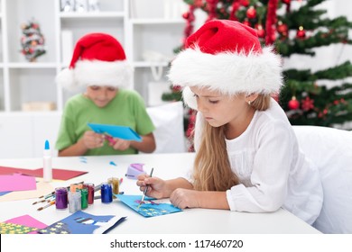 Kids Making Christmas Or Seasonal Greeting Cards